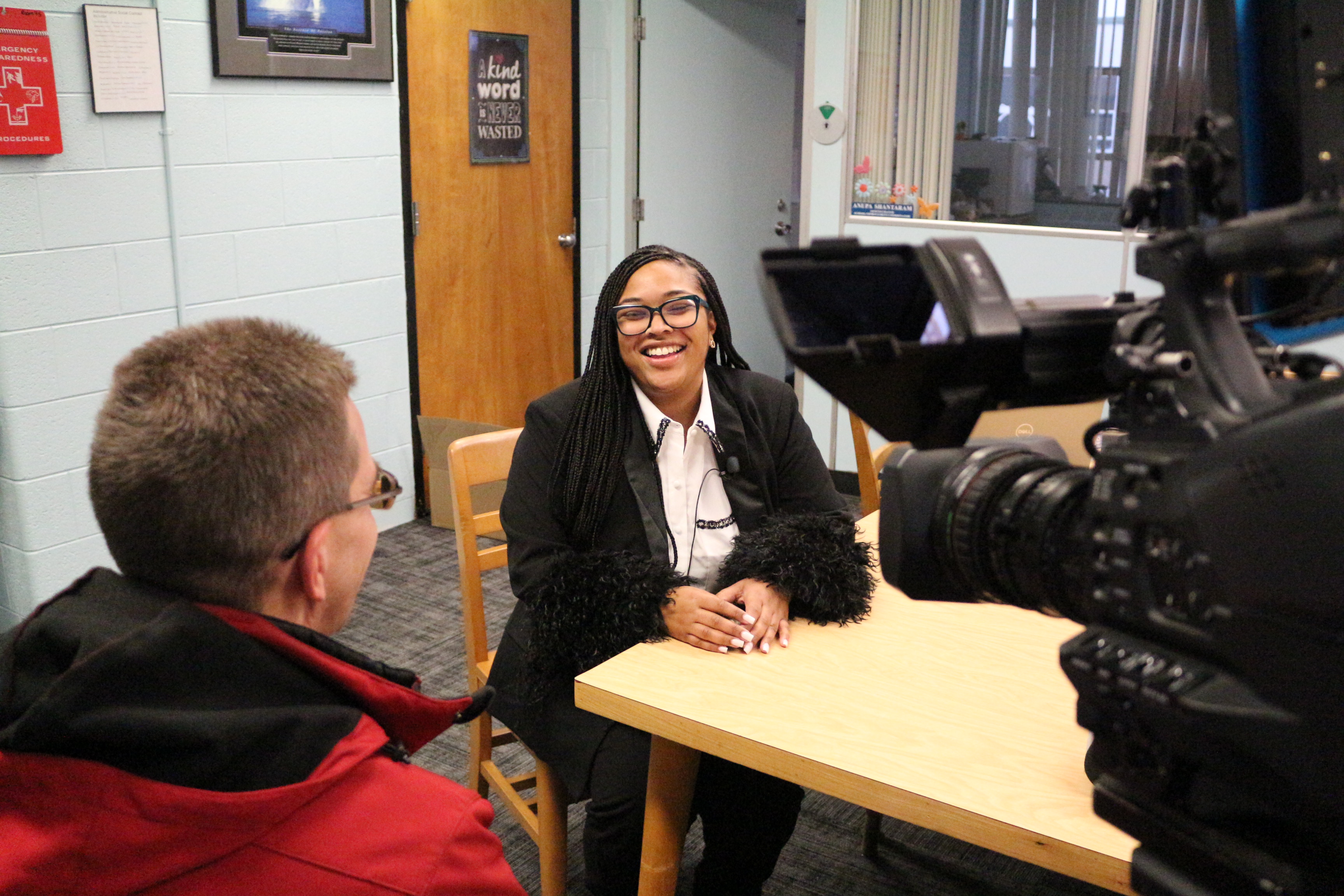 Latrese Carruth smiling during an interview