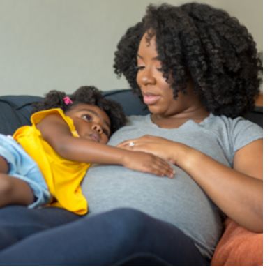 Pregnant mother and young child